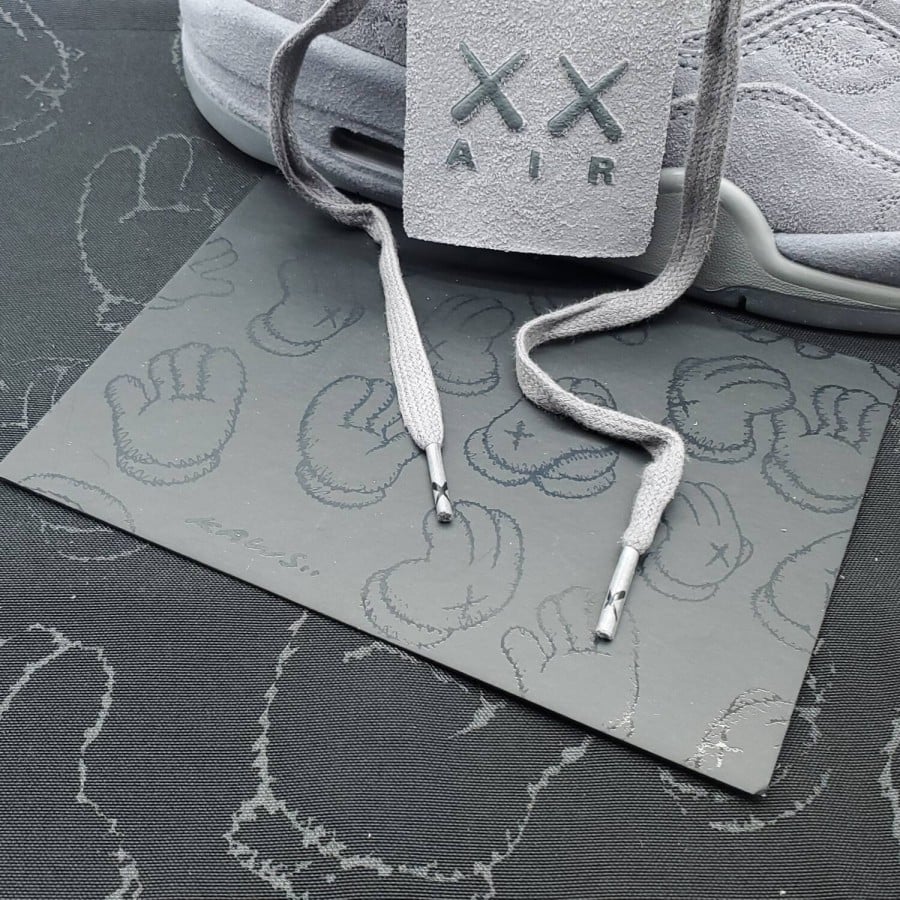 KAWS x Air Jordan 4 Retro